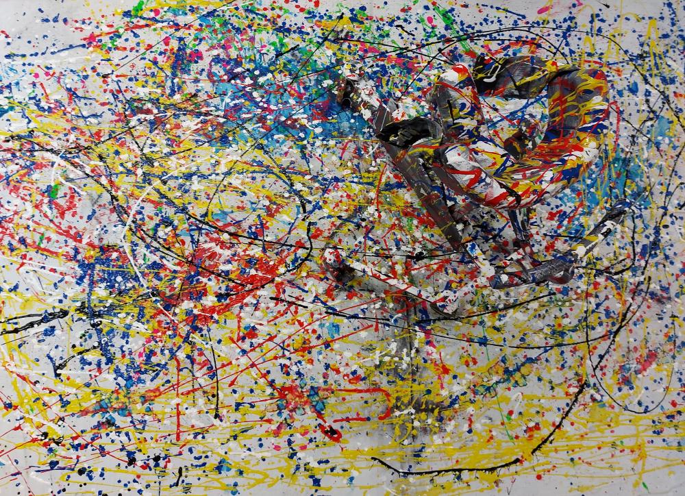 A white canvas with a walker attached to it. Both the walker and the canvas have been splattered with many colours of paint.